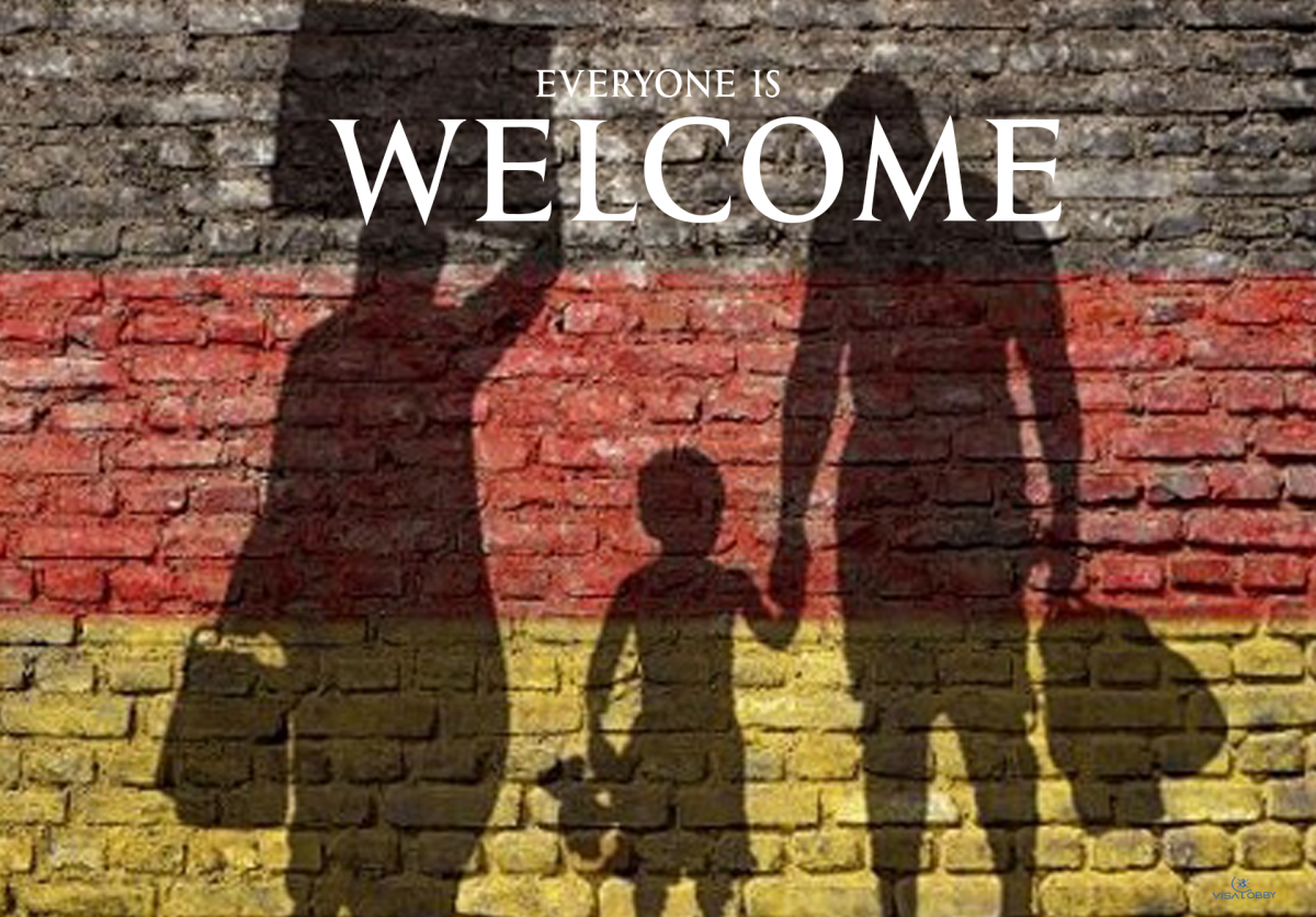 A written text on a wall saying "Everyone is Welcome" - How Many Migrants in Germany 2022?