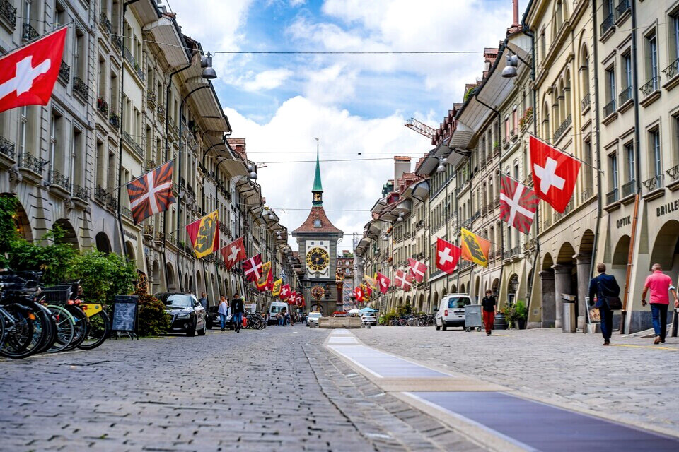 People Marching in UK Streets- UK And Swiss Extends Trade Agreement