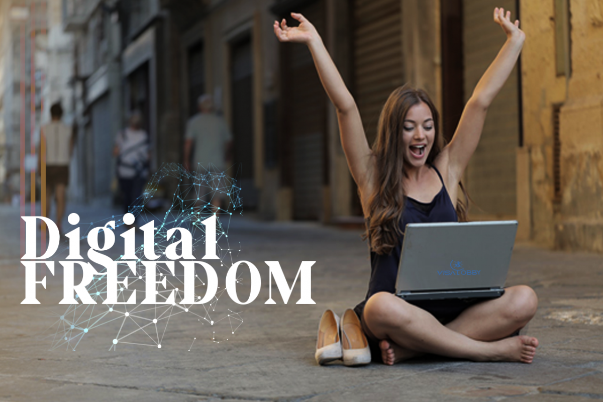 A happy girl sitting on street with a laptop - Digital Nomad Visa 2022