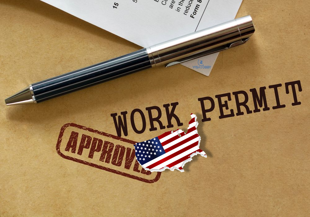A person filling visa application form - Extension of Work Permits for 18 Months By USCIS