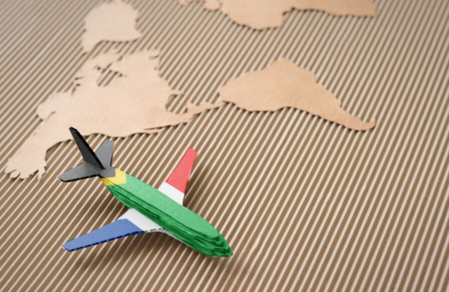 A small plan coloured as South Africa's flag promotes traveling to the country -SA announce new visa