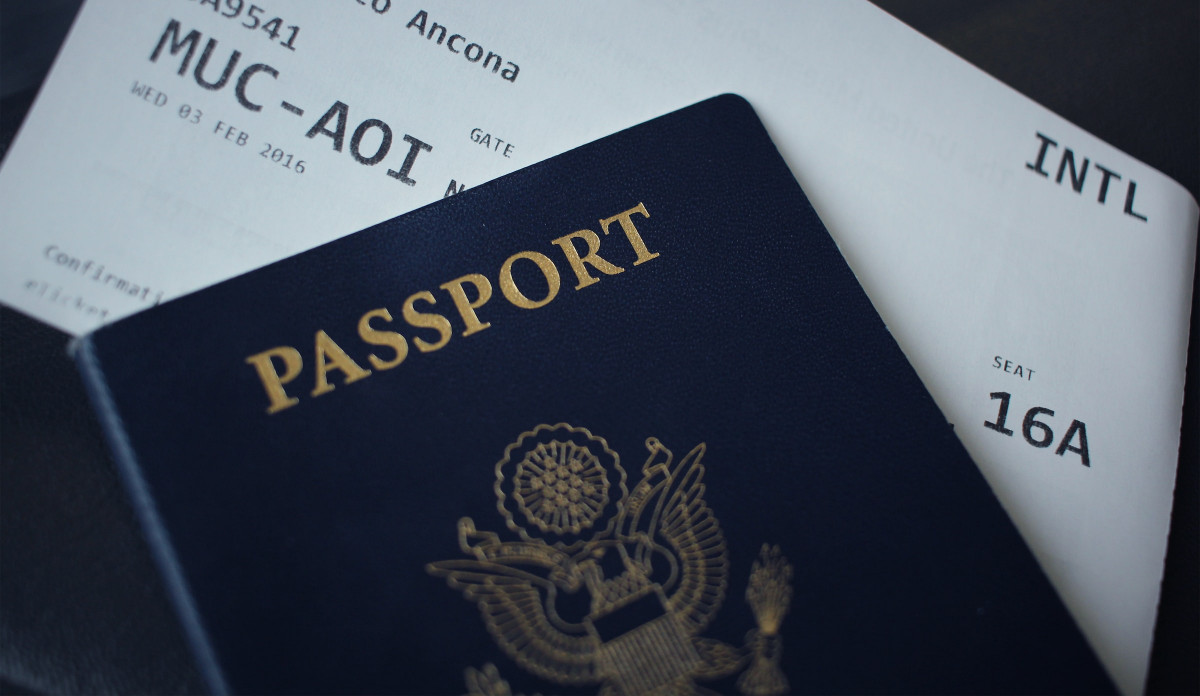 A passport and an airline ticket - World's Most Powerful Passports List