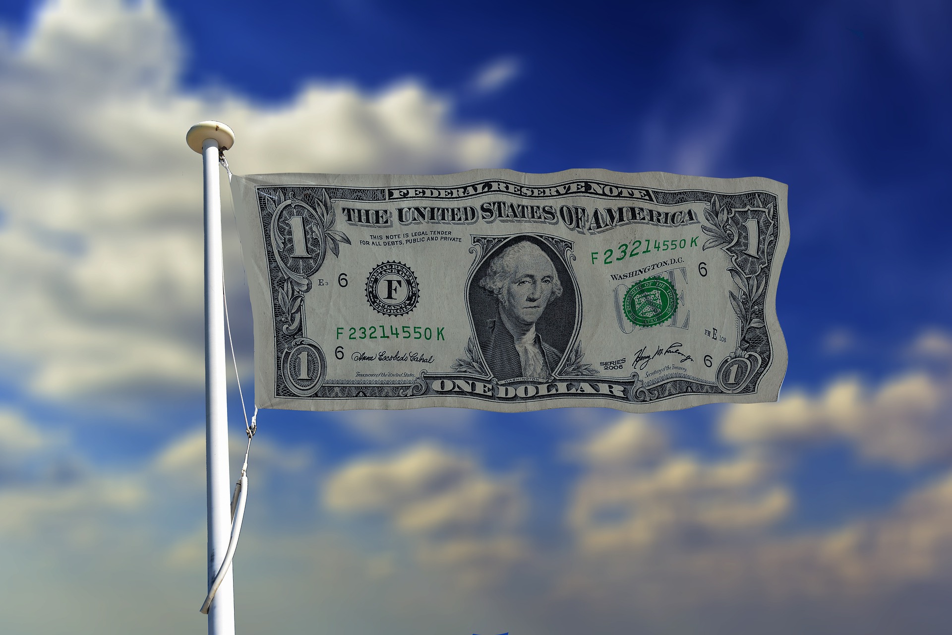 A flag made of 1USD - There is a close association between US business visa and USD