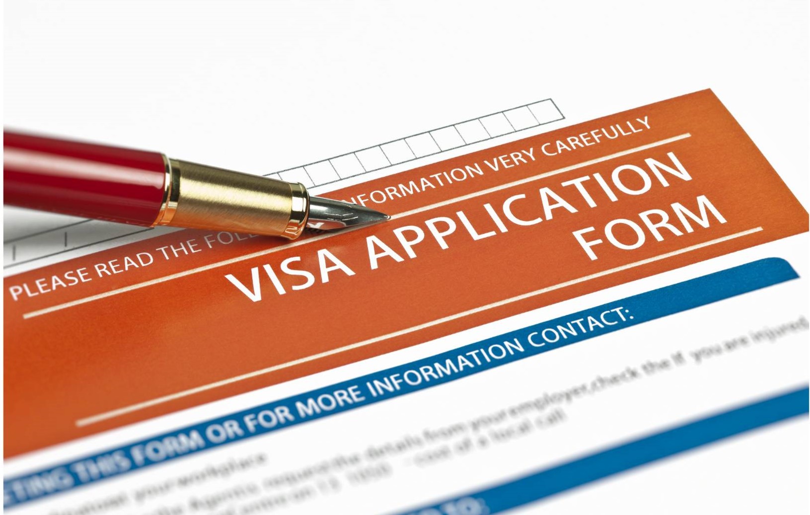 A visa application form with a pen - Digital Nomad visa Greece