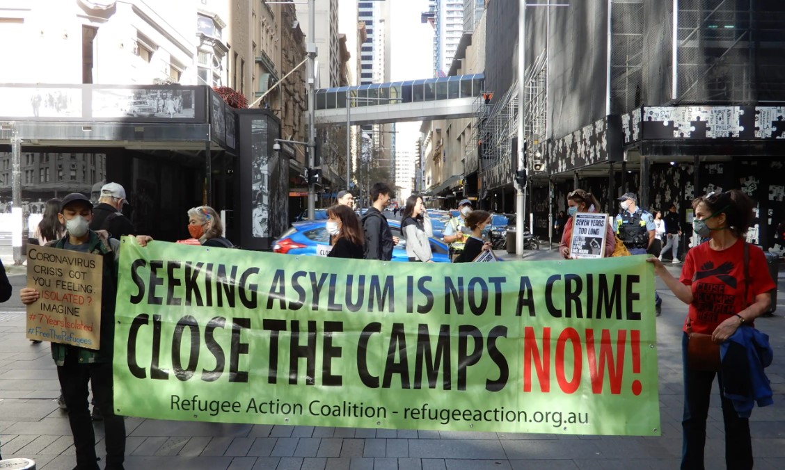 People in Australia protesting for asylum seekers - Australia's Indefinite Detention Laws